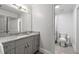 Stylish bathroom with granite countertops, modern fixtures, and plenty of cabinet space for storage at 145 Mount Shasta Ln, Johns Creek, GA 30022