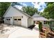 Lovely home featuring an attached two car garage and landscaped yard at 145 Mount Shasta Ln, Johns Creek, GA 30022