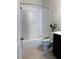 Bright bathroom with tiled shower/tub and modern vanity at 3235 Chutney Ct, Avondale Estates, GA 30002