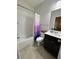 Small bathroom with tub and shower combination and tile floors at 3235 Chutney Ct, Avondale Estates, GA 30002