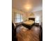 Bedroom featuring wood floors and neutral walls at 3235 Chutney Ct, Avondale Estates, GA 30002
