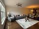 Open living room with hardwood floors, a ceiling fan, and lots of natural light at 3235 Chutney Ct, Avondale Estates, GA 30002