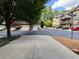 Townhomes featuring attached garages and landscaping on a quiet cul-de-sac in a well-maintained community at 3235 Chutney Ct, Avondale Estates, GA 30002