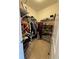 Well-organized walk-in closet with shelving, hanging racks, and ample storage for shoes and accessories at 3235 Chutney Ct, Avondale Estates, GA 30002