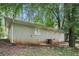 Backyard view of the home's exterior, showcasing the yard at 4009 Kirksford Dr, Decatur, GA 30035
