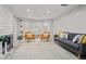 Sunlit living room boasts a cozy seating area, fireplace, and contemporary decor for relaxation and entertainment at 4113 Ashford Green Dr, Duluth, GA 30096