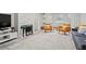 Inviting living room featuring a stone fireplace, modern furniture, and decorative accents for a cozy ambiance at 4113 Ashford Green Dr, Duluth, GA 30096