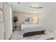 Comfortable main bedroom featuring a ceiling fan, neutral colors, and bright natural light at 4113 Ashford Green Dr, Duluth, GA 30096