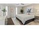 Relaxing main bedroom with a ceiling fan, neutral colors, and decorative accents at 4113 Ashford Green Dr, Duluth, GA 30096