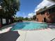 A refreshing community pool with lounge chairs, perfect for relaxation and enjoyment at 4113 Ashford Green Dr, Duluth, GA 30096