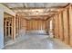 Unfinished basement space showcasing the wooden framing, ready to be customized at 4250 Pembia Dr, Cumming, GA 30028