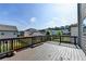 This home features a spacious deck with wooden railings and backyard views at 4250 Pembia Dr, Cumming, GA 30028