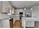 Kitchen featuring stainless steel appliances, granite countertops and a center island at 4250 Pembia Dr, Cumming, GA 30028