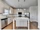 Kitchen with granite countertops, stainless steel appliances, and a center island at 4250 Pembia Dr, Cumming, GA 30028