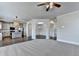 Open floorplan showcasing living room that leads to kitchen and dining area at 4250 Pembia Dr, Cumming, GA 30028
