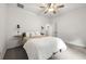 Bright bedroom features plush carpet, modern lighting, and plenty of natural light at 853 Gaston Sw St, Atlanta, GA 30310