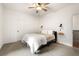 Comfortable bedroom with modern lighting fixtures, plush carpet, and neutral decor throughout at 853 Gaston Sw St, Atlanta, GA 30310