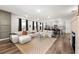 Spacious living room with hardwood floors, an open layout, and modern decor at 853 Gaston Sw St, Atlanta, GA 30310
