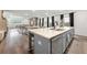 Bright open floor plan featuring an island, kitchen, dining area, and living room with lots of natural light at 853 Gaston Sw St, Atlanta, GA 30310