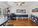 Bonus room with hardwood floors, a cat tree, desk, and TV at 2009 Mclain Nw Rd, Acworth, GA 30101