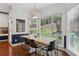 Cozy dining area with large windows, a modern light fixture, and stylish decor, ideal for Gathering meals at 2009 Mclain Nw Rd, Acworth, GA 30101