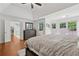 A view of the spacious primary bedroom with a door to the primary bathroom at 2009 Mclain Nw Rd, Acworth, GA 30101