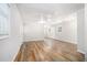 Open living room with wood-look flooring and plenty of natural light at 2721 Glenvalley Dr, Decatur, GA 30032
