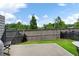 Backyard featuring a small patio and a partial view of the treeline at 320 Crider Ct, Woodstock, GA 30188