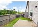 Well-maintained backyard featuring a concrete patio and lush green grass at 320 Crider Ct, Woodstock, GA 30188