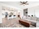 Open-concept living area with a kitchen island, comfortable seating, and stylish decor at 320 Crider Ct, Woodstock, GA 30188