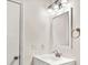 Well-lit bathroom with white vanity, modern fixtures, and crisp clean design at 4679 Candlewyck Way, Buford, GA 30518
