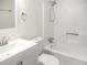 Bright bathroom features a white toilet, sink, tub, and modern fixtures at 4679 Candlewyck Way, Buford, GA 30518