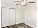 Bedroom featuring closet and hardwood floors at 4679 Candlewyck Way, Buford, GA 30518