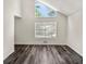 Bright bedroom with large windows and hardwood floors at 4679 Candlewyck Way, Buford, GA 30518