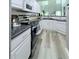 Well-equipped kitchen with modern appliances, stone countertops, and ample cabinet space at 49 Hampton Dr, Cartersville, GA 30121