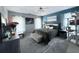 Comfortable bedroom features trey ceilings, soft natural light, and coordinating decor at 49 Hampton Dr, Cartersville, GA 30121
