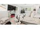 Bedroom with mirrored fireplace, large TV, and two windows at 1151 Bromley Rd, Avondale Estates, GA 30002