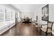 Spacious dining room with hardwood floors, a large window, and stylish decor at 1151 Bromley Rd, Avondale Estates, GA 30002