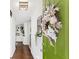 Welcoming entryway with a bright green door, stylish wreath, and hardwood floors at 1151 Bromley Rd, Avondale Estates, GA 30002