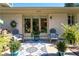 Cozy patio with seating, plants, and backyard access at 1151 Bromley Rd, Avondale Estates, GA 30002
