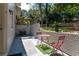 Covered patio with outdoor seating overlooking the backyard at 1151 Bromley Rd, Avondale Estates, GA 30002