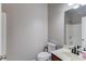 Bathroom with a white toilet, vanity, and shower at 2030 Beyers Landing Dr, Buford, GA 30519