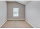 Bright bedroom with a window, neutral walls, and carpet flooring to offer comfort and style at 2030 Beyers Landing Dr, Buford, GA 30519