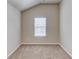 Bright bedroom with a window, neutral walls, and carpet flooring to offer comfort and style at 2030 Beyers Landing Dr, Buford, GA 30519