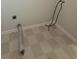 Simple laundry room featuring checkered flooring and basic hookups at 294 Spring Leaf Dr, Dallas, GA 30157
