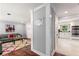 Spacious living room flows into the kitchen, hardwood floors, and neutral paint, creating a welcoming atmosphere at 440 Barrington W Dr, Roswell, GA 30076