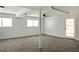 Basement with gray carpet flooring, natural light and neutral wall color at 1392 Cornwall Rd, Decatur, GA 30032