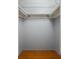 Walk-in closet with ample shelving and hardwood flooring at 1392 Cornwall Rd, Decatur, GA 30032