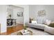 Bright and airy living room with hardwood floors and seamless flow into the dining area at 1392 Cornwall Rd, Decatur, GA 30032