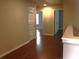 Spacious hallway with hardwood floors and access to various rooms at 1783 Shetley Creek Drive, Norcross, GA 30071